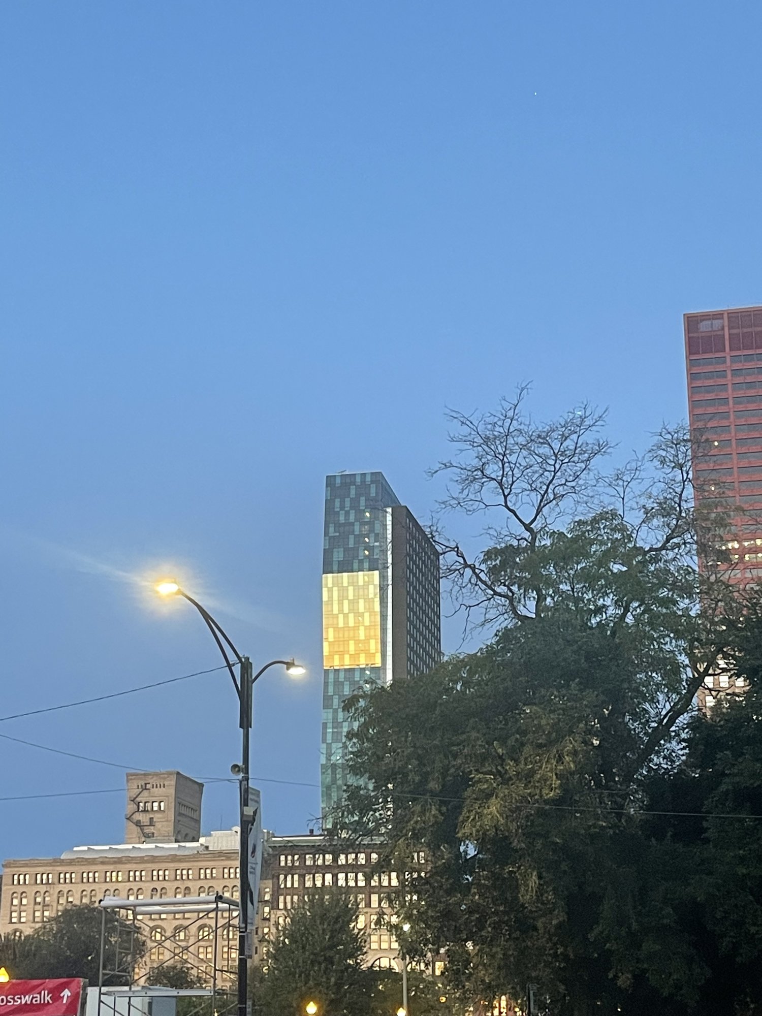 Morning sun reflecting on a skyline building